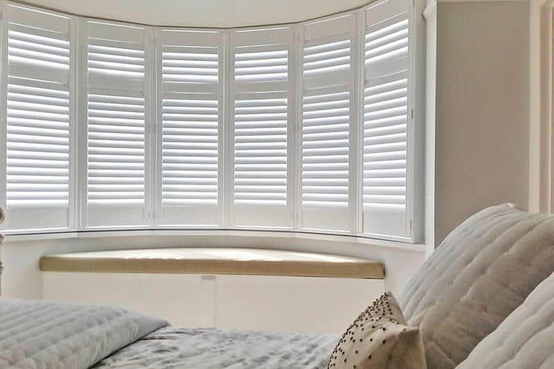 Full Height window shutters in bedroom