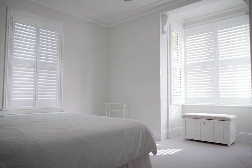 Full Height window shutters in bedroom