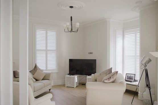 Living Room Shutters Full Height with Midrail Divide